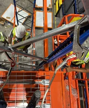 Installing a storage cabin at height in pallet racking on site